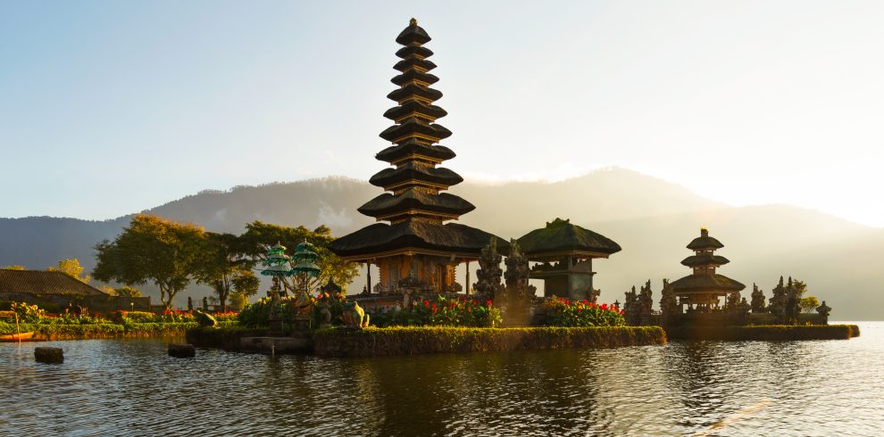 Peaceful atmosphere in early morning during sunrise over Pura Ulun Danu temple the Iconic of Bali, lake Bratan, Bali, Indonesia.